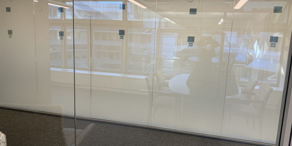 A close up image of a glass installed in the office.