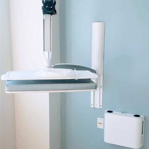 A sleek white wall-mounted television installed on a clean, minimalist wall, enhancing the modern decor of the room.